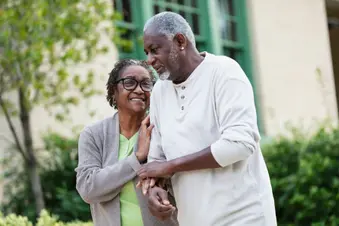 photo of senior couple walking