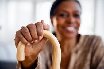 photo of woman with cane
