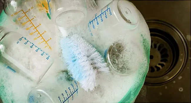 Bottle of milk are washing