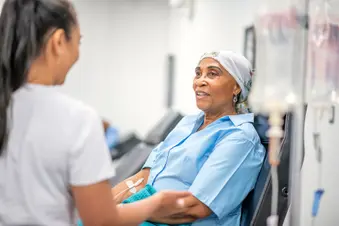 photo of senior woman receiving chemotherapy treatment