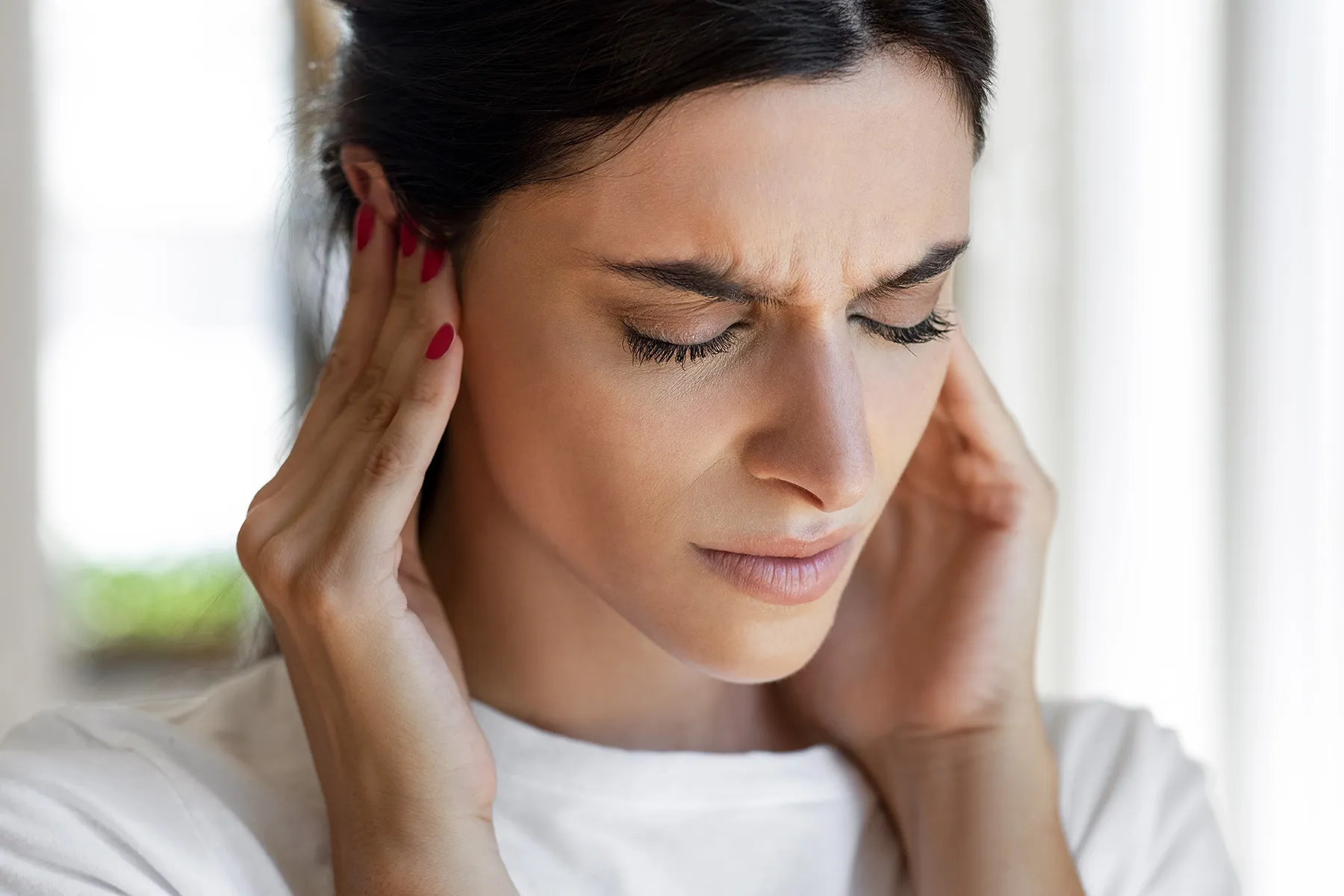 photo of woman with tinnitus