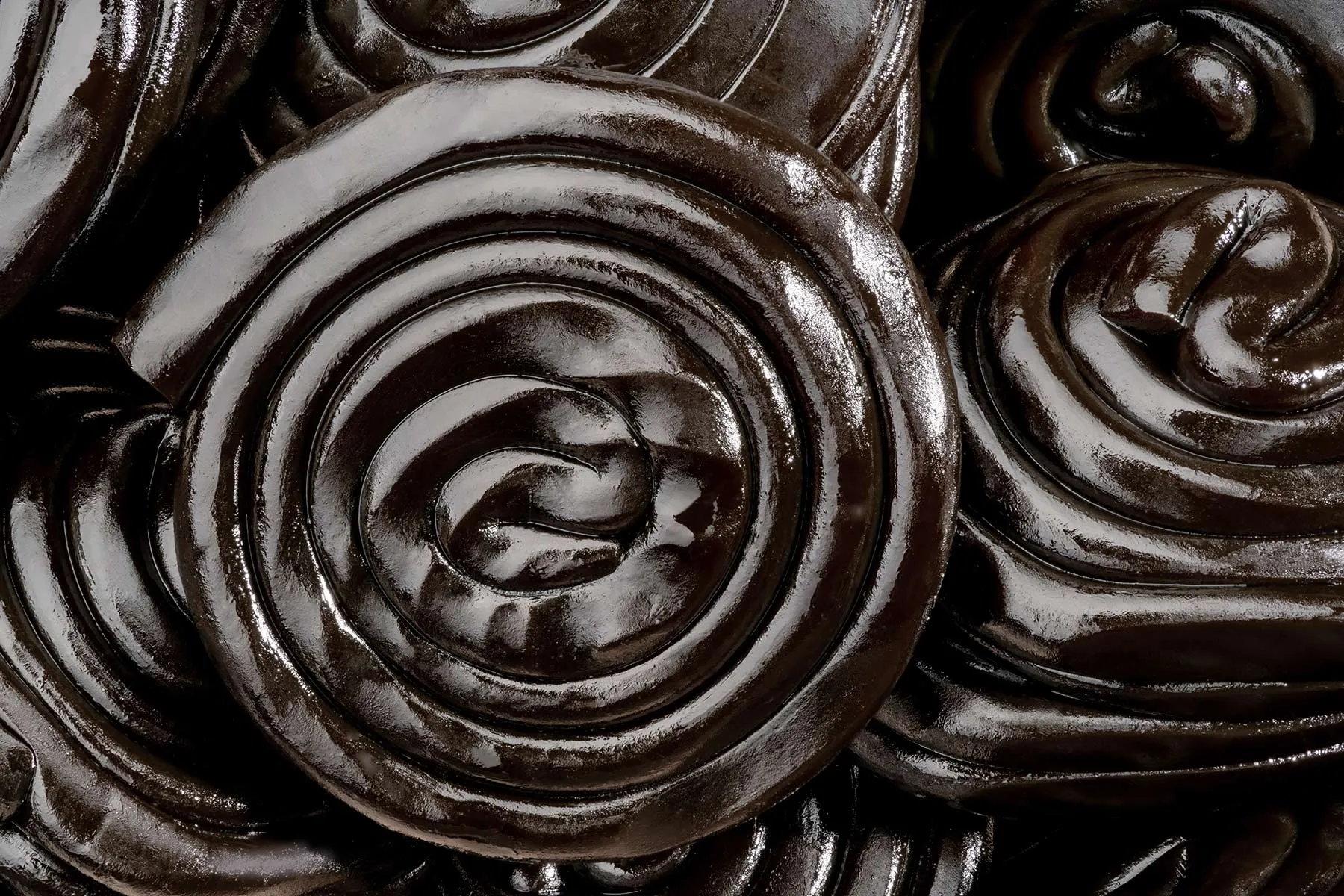 photo of black licorice wheels close up