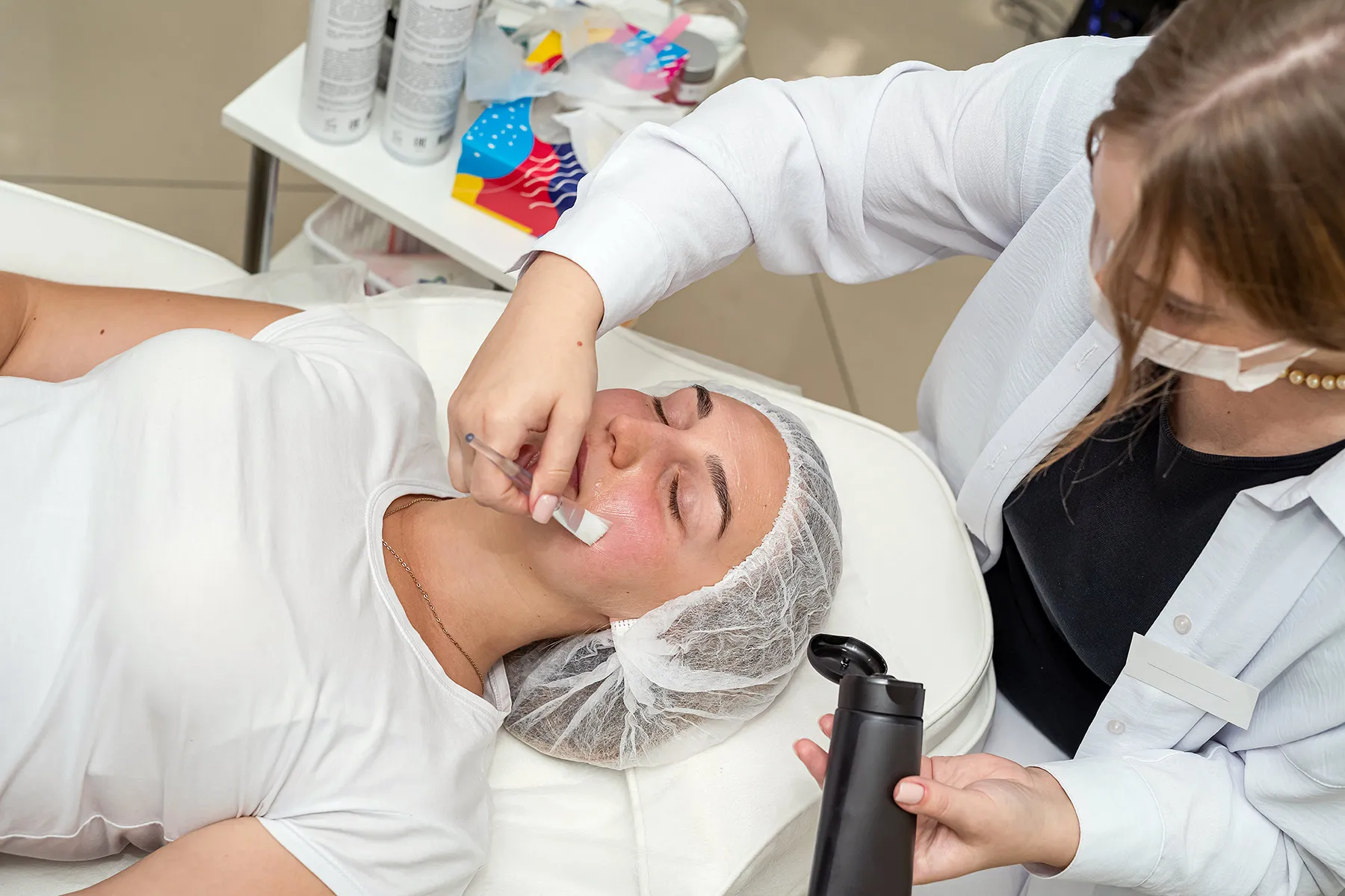 photo of woman receiving facial chemical peel