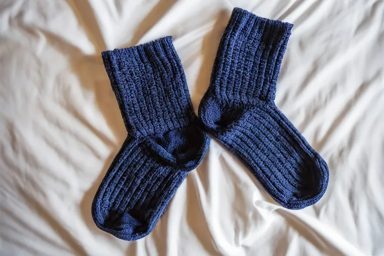photo of thick socks on bed
