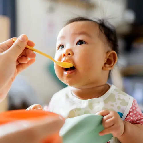 photo of feeding baby