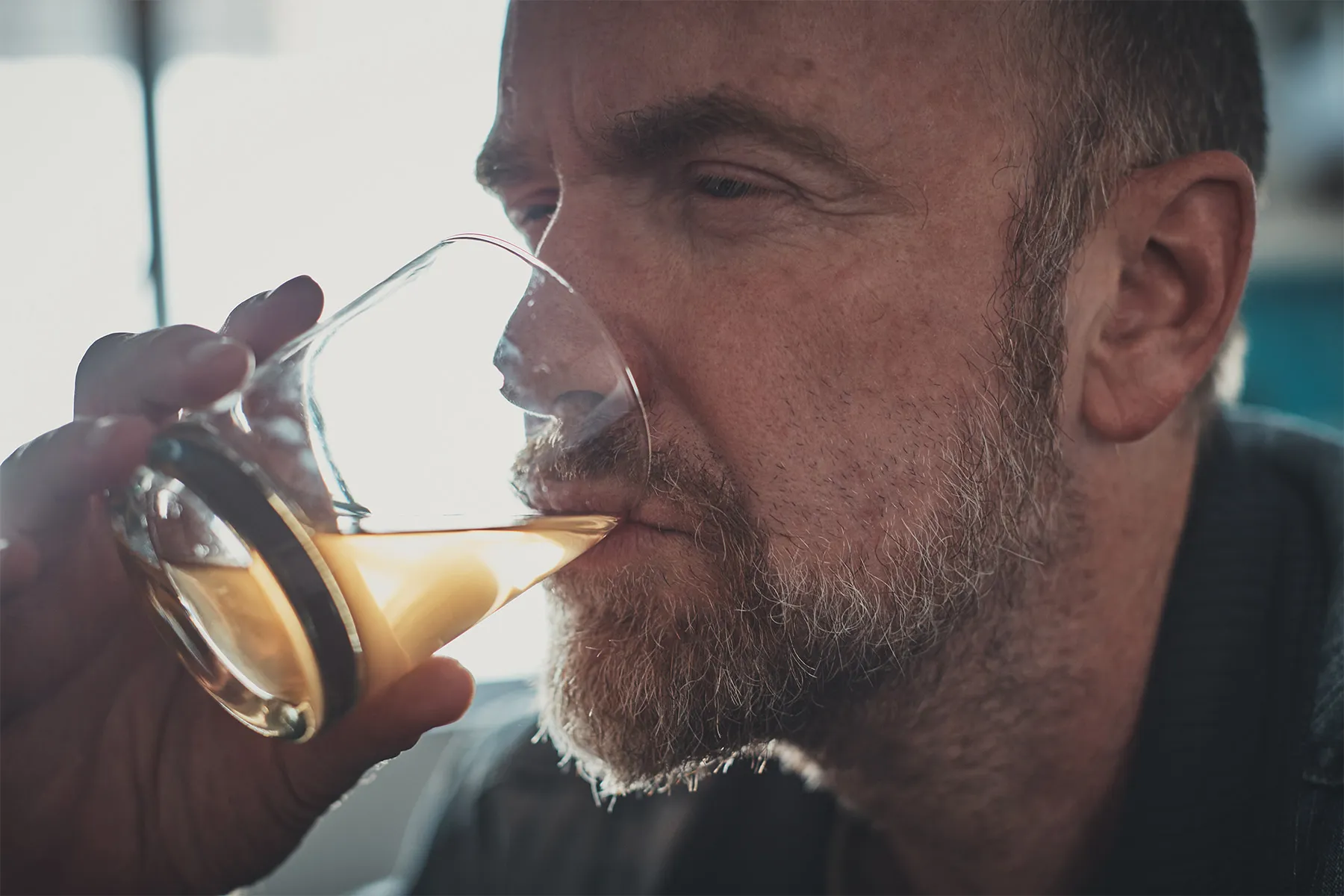 photo of man drinking