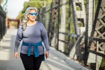 photo of mature woman walking