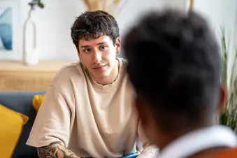 photo of adult friend listening intently