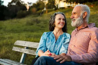 photo of senior couple on park bench