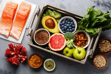 While the Paleo diet encourages eating fresh foods, some versions allow you to add frozen fruits and vegetables. (Photo Credit: iStock/Getty Images)