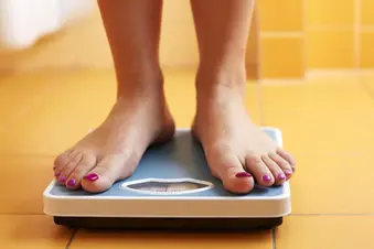 feet on weight scale