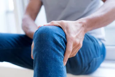 Your knee pain might start suddenly, or it could build up from mild discomfort to more painful over time. It can be caused by injury, overuse, aging, arthritis, or a variety of other medical conditions. Being active is one of the best things you can do for your joints and the rest of your body. (Photo credit: Science Photo Library / Getty Images)