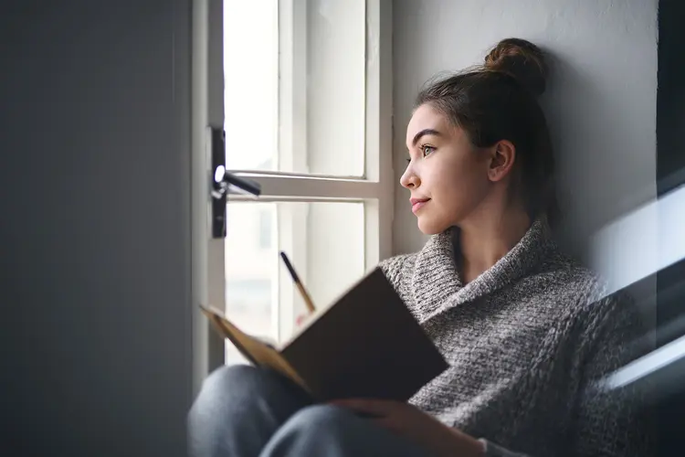 photo of writing in journal