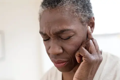 photo of woman with ear ache
