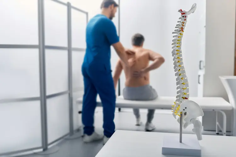 photo of man getting a spinal exam