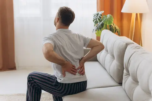 photo of man with lower back pain