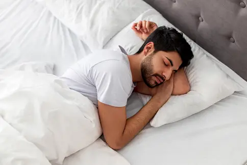 photo of adult male sleeping