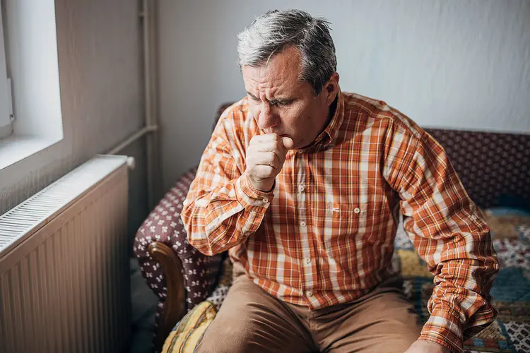 photo of man coughing