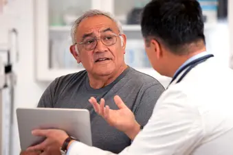photo of doctor patient consultation