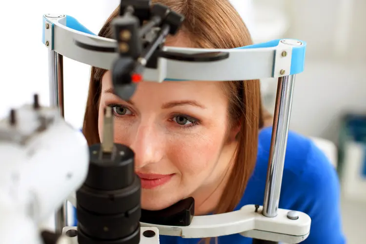 photo of woman getting an eye exam