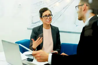 photo of coworkers having a meeting