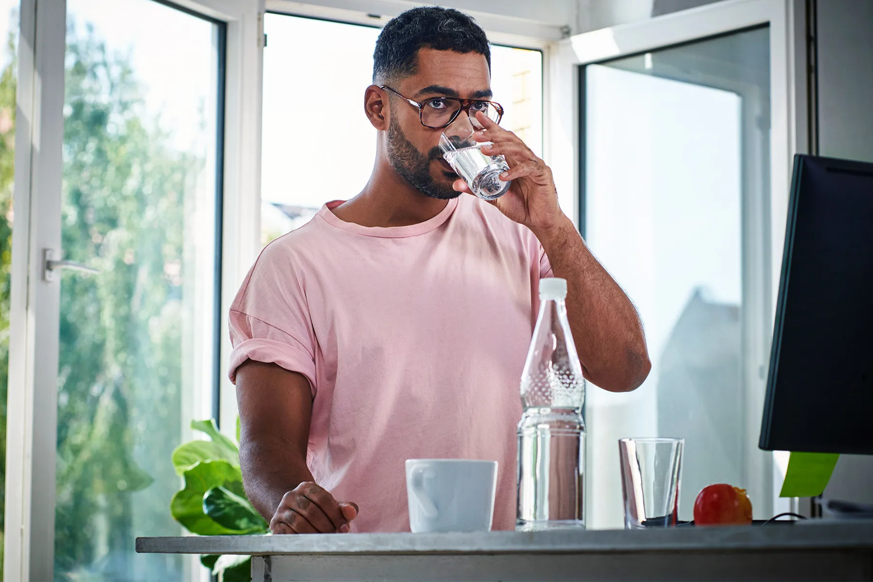photo of Man drinking water