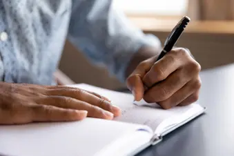 photo of writing in journal