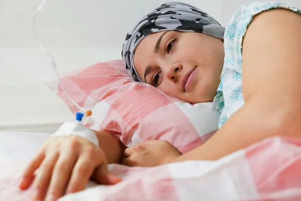 photo of hopeful woman receiving chemotherapy