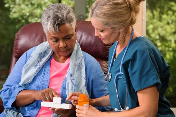 photo of palliative care nurse in home