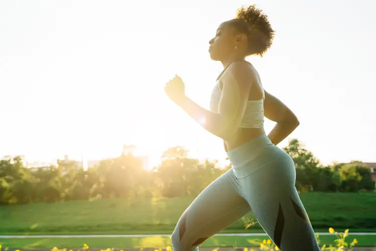 photo of woman running outside