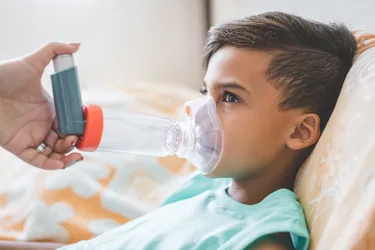 You may need to use a spacer to help your child take their inhaler medicine. It can help them breathe the medicine in at their own pace. (Photo Credit: E+/Getty Images)