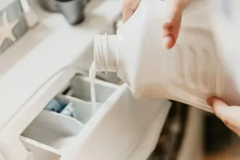 photo of pouring detergent