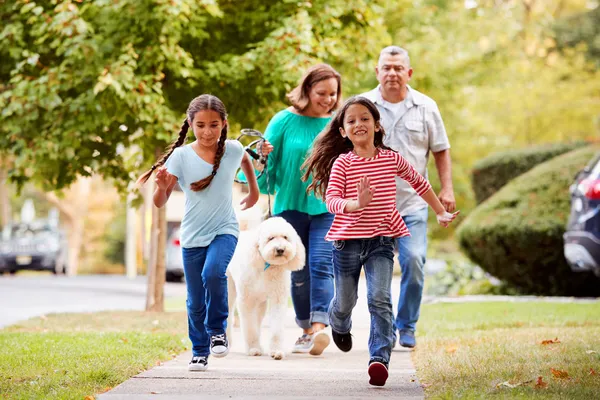 photo of family walking outside