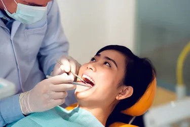 It's important to understand what's covered in your dental insurance so you can stay up to date on preventive care such as exams and cleanings. (Photo Credit: iStock/Getty Images)