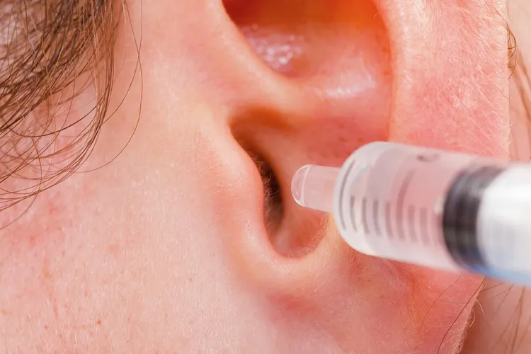 applying ear drops