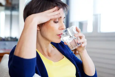 woman experiencing hot flash