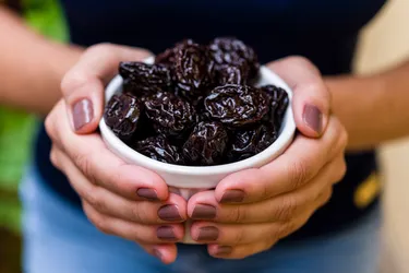 Prunes are a tasty snack, and they may offer health benefits beyond a sweet treat. (Photo Credit: iStock/Getty Images)