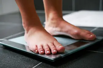 photo of feet on weight scale