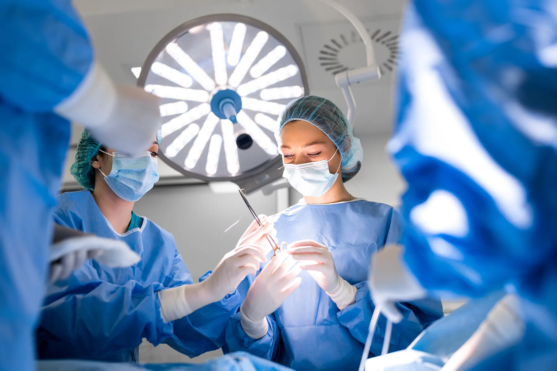 photo of female surgeon in operating room