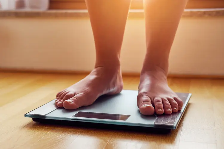 photo of feet on scale