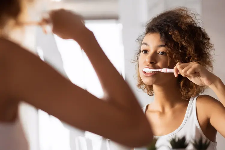 photo of brushing teeth