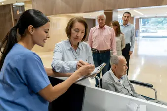 photo of paying for services in doctor office
