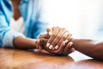 photo of People holding hands