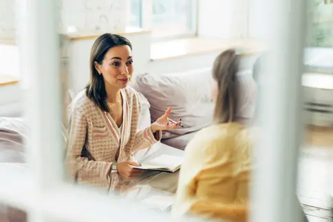 photo of woman meeting with ot