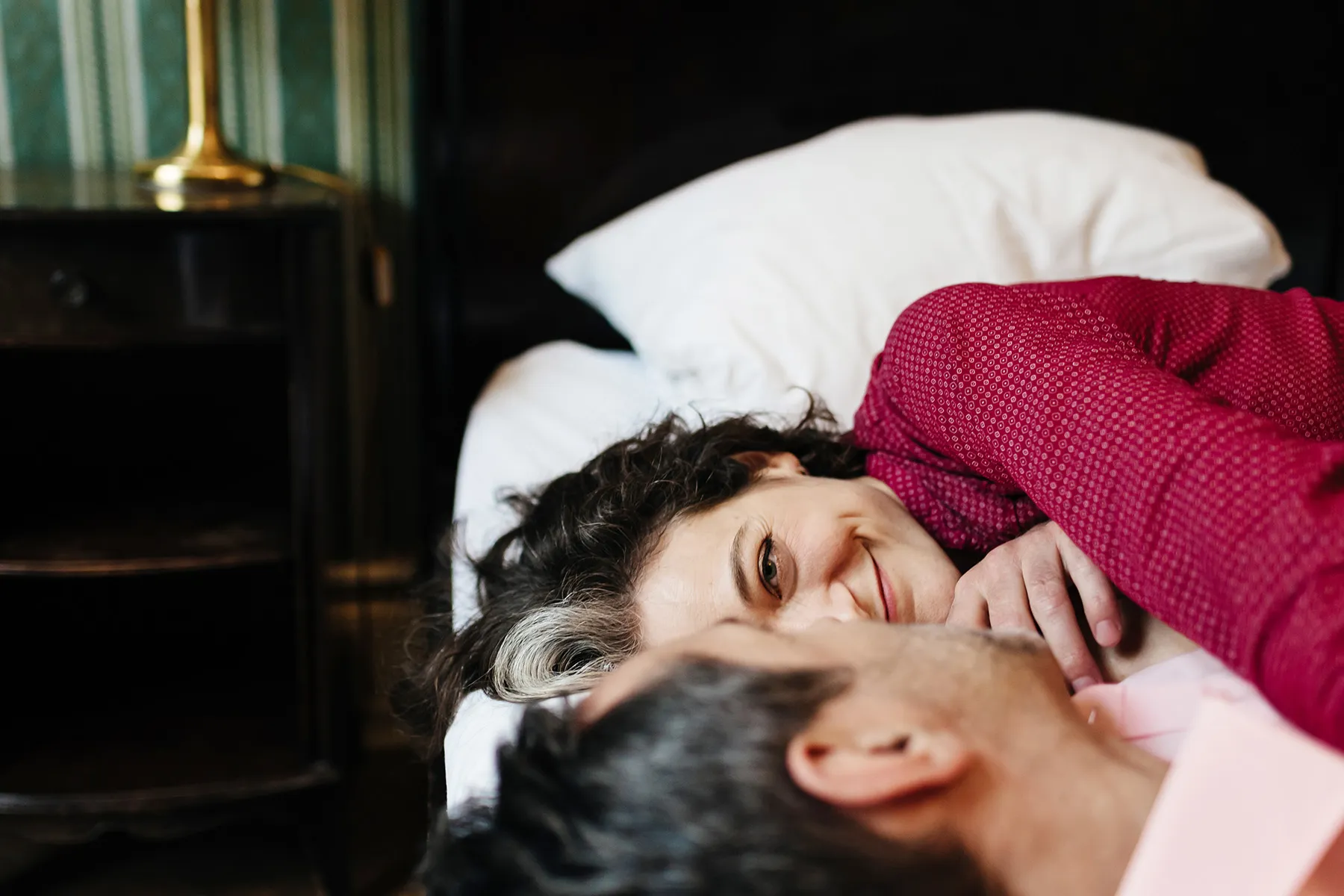 photo of couple in bed