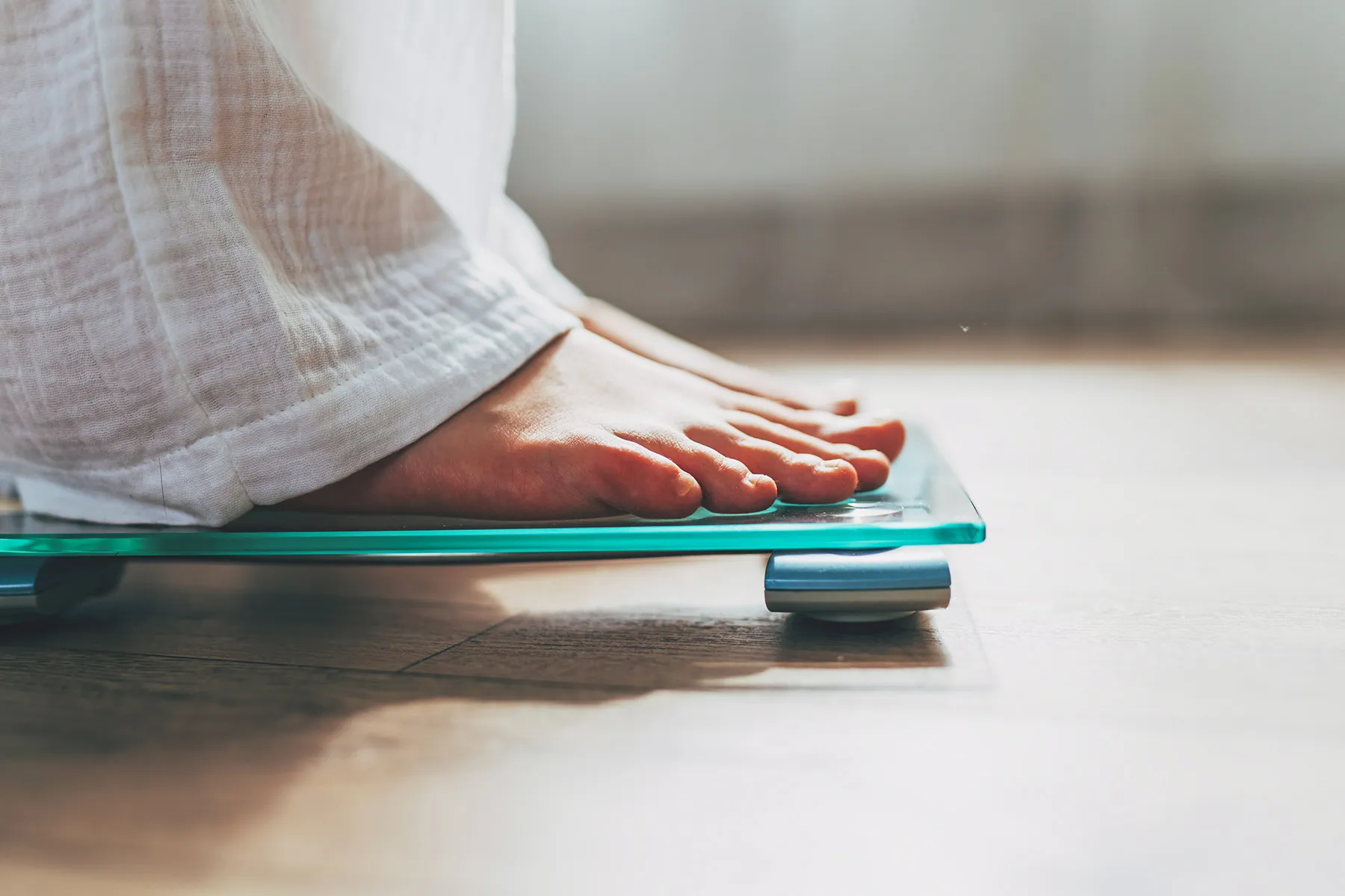 photo of Female on weighing scale