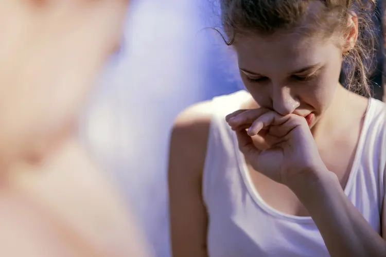 photo of woman feeling nauseated