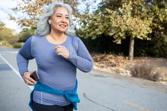 photo of mature woman walking
