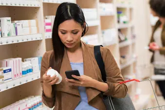 photo of woman shopping at pharmacy
