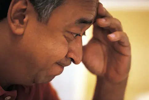 photo of mature man feeling confused